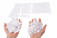 Shredded paper, security white pile in hand